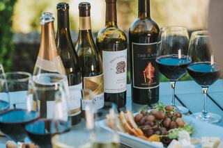 Bottles of wine with charcuterie platter