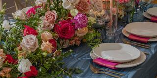Plated table set up with flowers for a special event