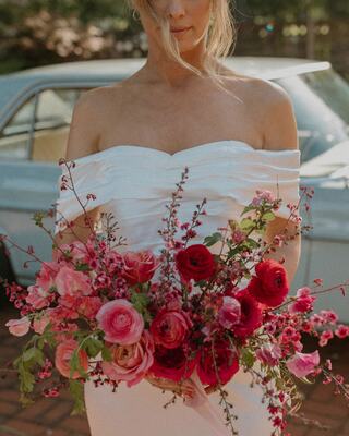 Bride holding flower bouquet