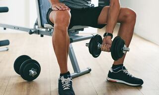 A Man Lifting a Free Weight Inside a Fitness Studio at a Napa Valley Resort