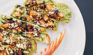 Gourmet Avocado Toast on a Plate with Sliced Apple Garnish