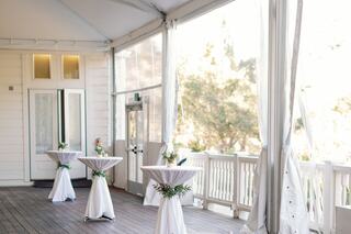 cocktail hour on a large deck with nature views in Napa