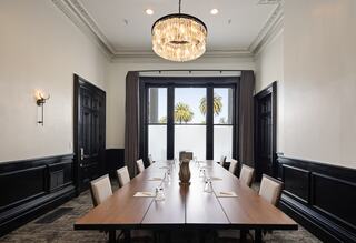 Meeting room in a resort in Napa Valley set up for a boardroom meeting with a table and chairs