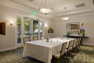 Meeting room in a resort in Napa Valley set up for a boardroom meeting with a table and chairs