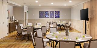 Table set up in rounds for breakout meetings