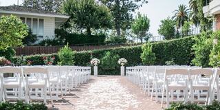 Wedding Ceremony set up in The Arbor outside in Napa Valley