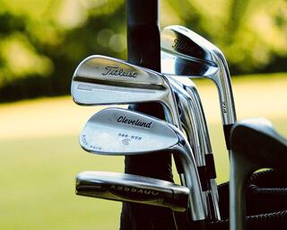 Golf Clubs Rested on a Golf Bag on a Golf Course