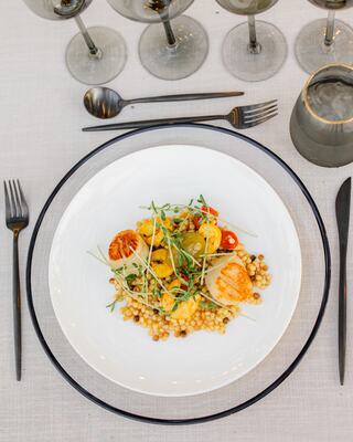 beautiful, color plate of cous cous scallops and shrimp
