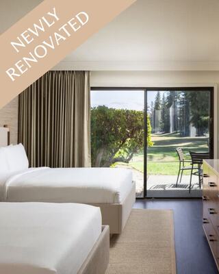 A Modern Hotel Room with Two Beds, a Lamp in Napa
