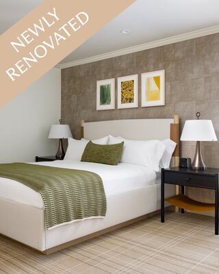 Hotel Room with a Bed, Furniture and a bottle of wine in Napa Valley