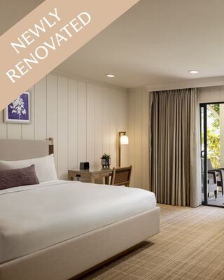 Hotel Room with a Bed and Furniture in Napa