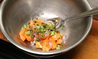 Salmon poke in a silver bowl