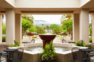 view of the spa fountain with Silverado Resort mansion in the background