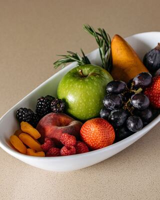 A Bowl of Fresh and Dried Fruits
