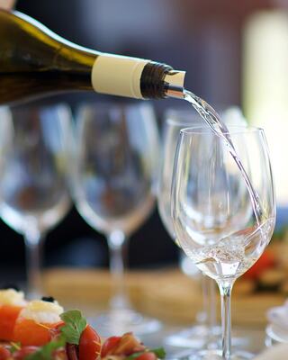 pouring wine into a glass