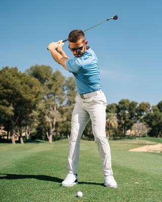 Golf Clubs Rested on a Golf Bag on the Course