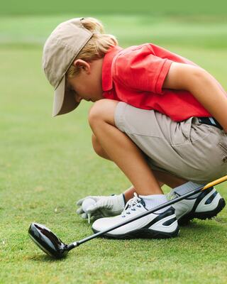 Boy with Golf Club on Napa Golf Course