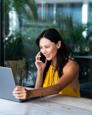 Woman Working from Home on Her Laptop