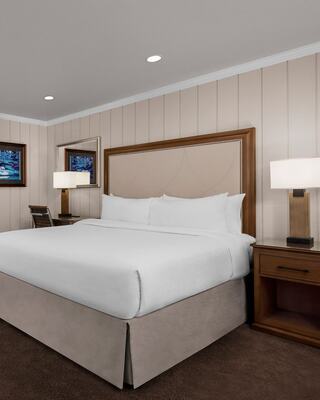 Hotel Room with a Bed and Furniture in Napa